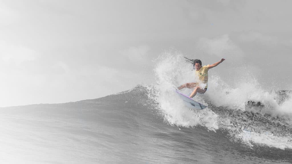 Girl surfing a wave