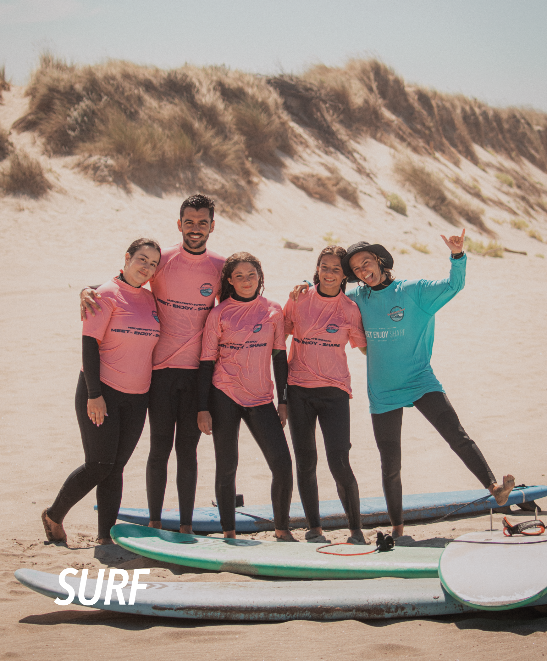 a group of people at a surf school in viana do castelo beach