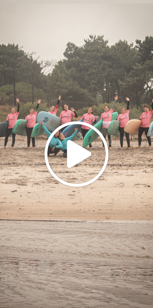 Group of girls taking lessons together on the beach